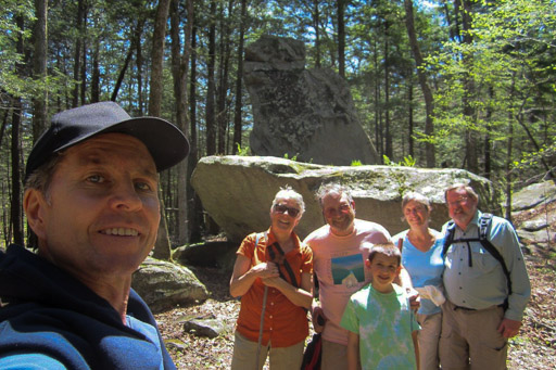 Group photo of hikers in front of Hawk Rock