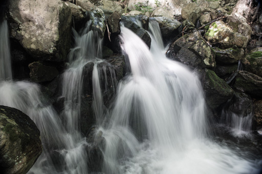 Long-exposure photo of a segmented waterfall
